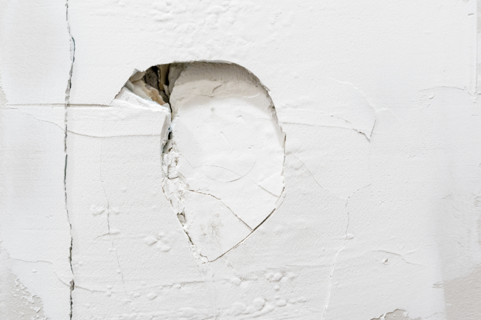 hole in drywall in need of repair