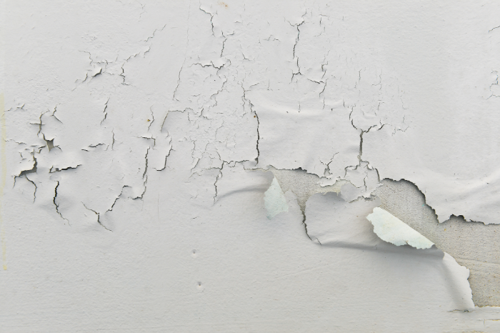 water damaged paint in drywall