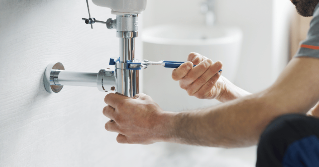 Small plumbing leak under a sink in a Pittsburgh home