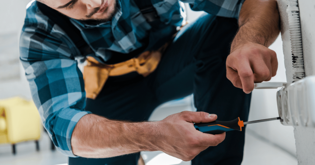 Handyman performing routine home maintenance in Pittsburgh