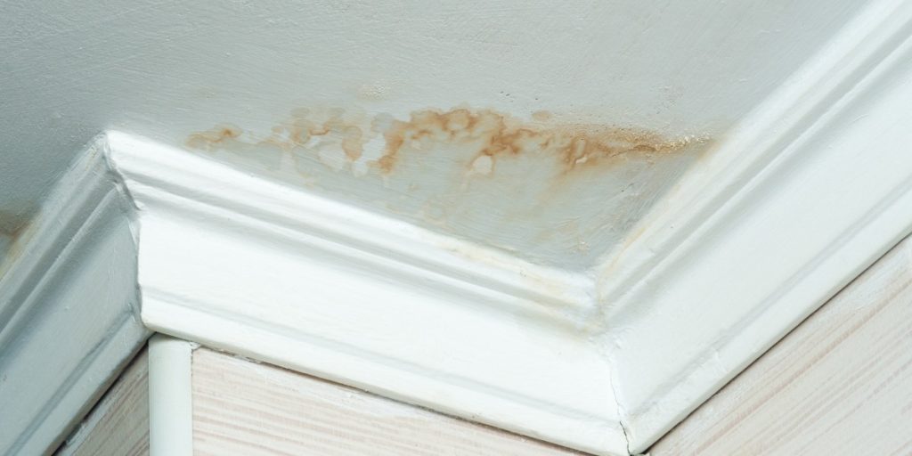 Interior ceiling stain caused by snow melt or ice dam in a Pittsburgh home