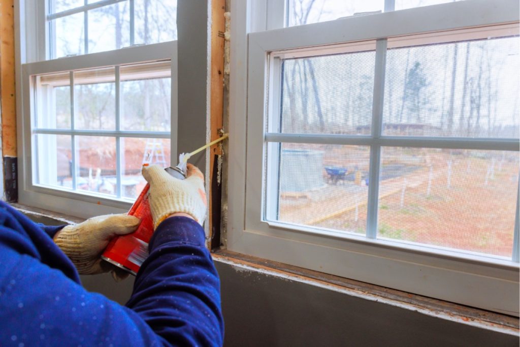 Cracked caulk and separated trim in a Pittsburgh home during winter