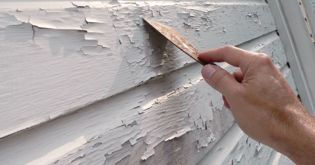 Peeling paint on exterior trim and small wood details of a Pittsburgh home