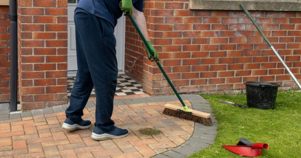 Patio surface being cleaned and prepared for spring use