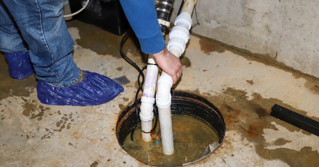 Water intrusion on basement floor after heavy spring rain — common spring storm home damage.