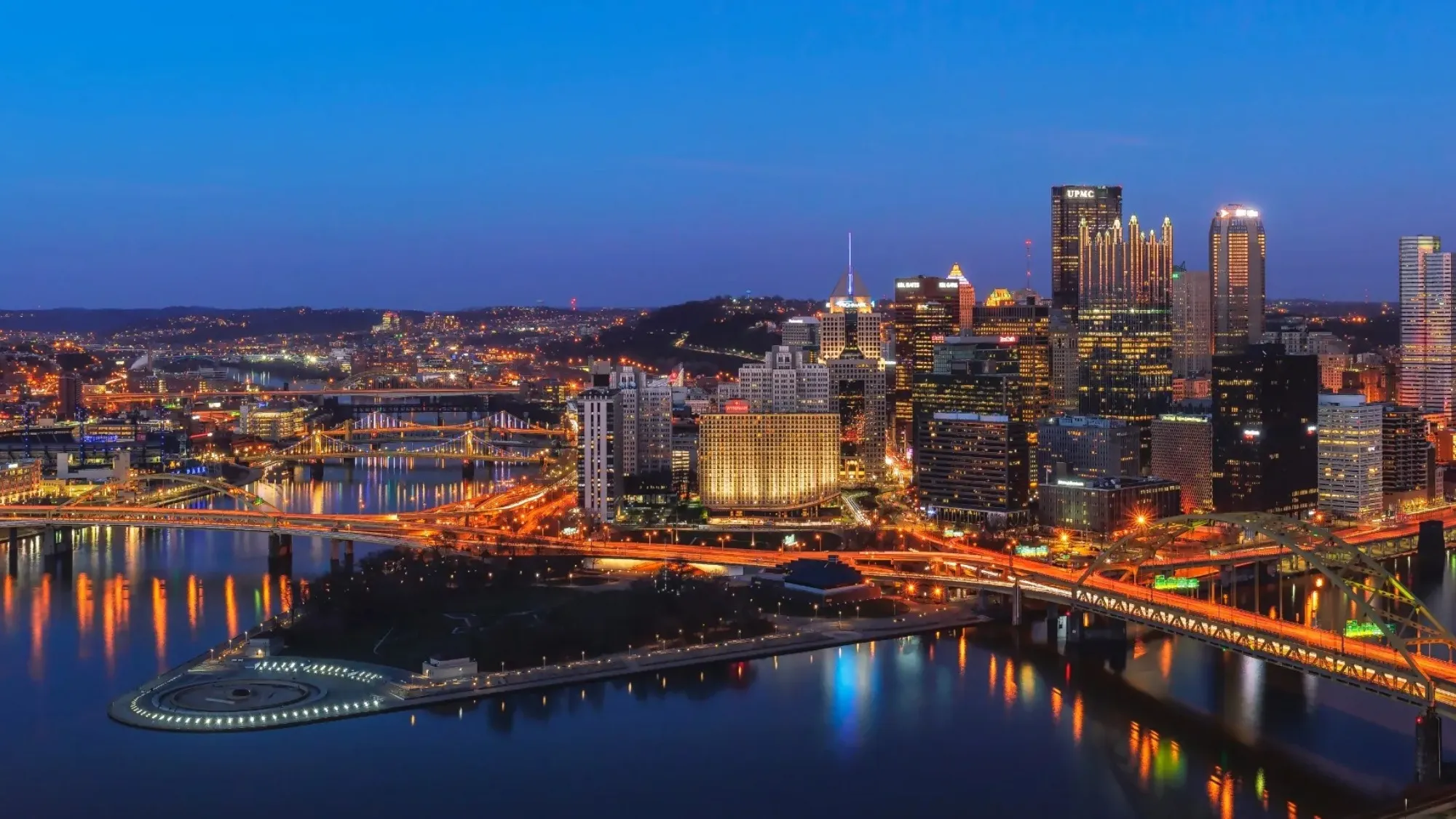 handyman services in pittsburgh skyline and river at dusk