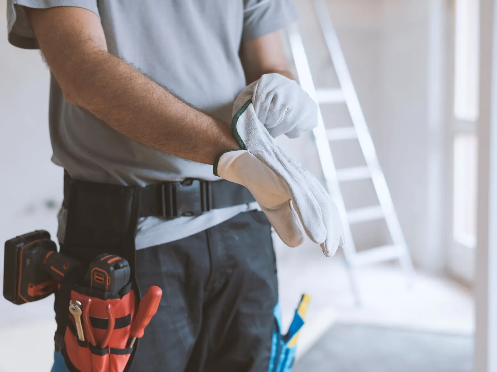 Technician working on white interior trim