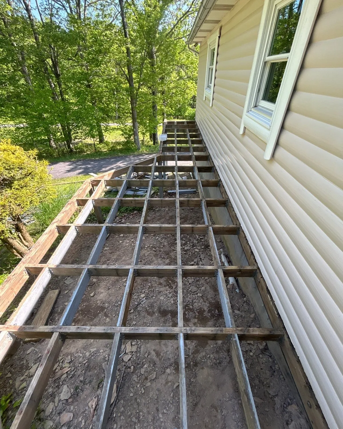 Exposed deck framing before new boards were installed
