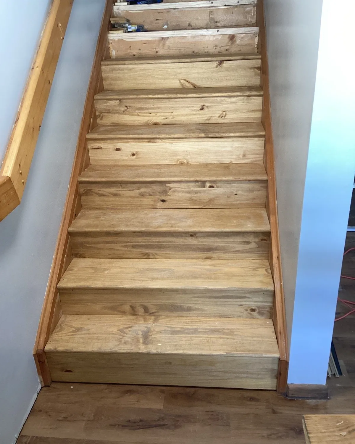 Wooden staircase stripped and prepared for refinishing