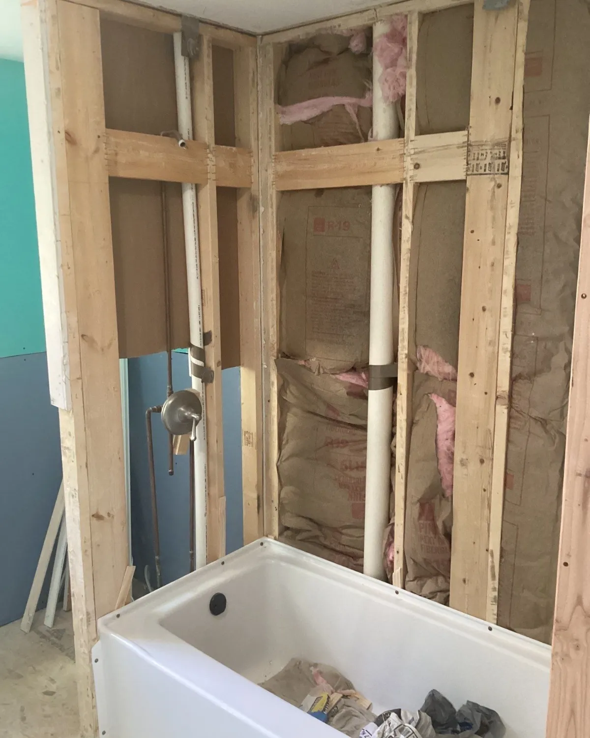 Bathtub alcove with exposed wall framing