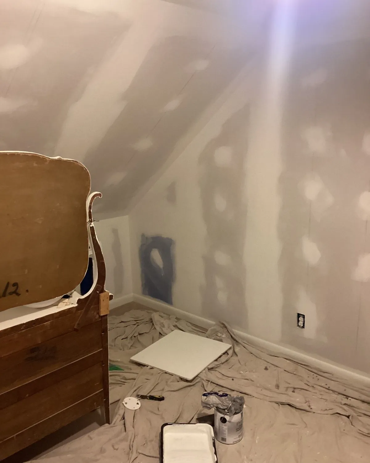 Bedroom walls being patched and prepared for finishing
