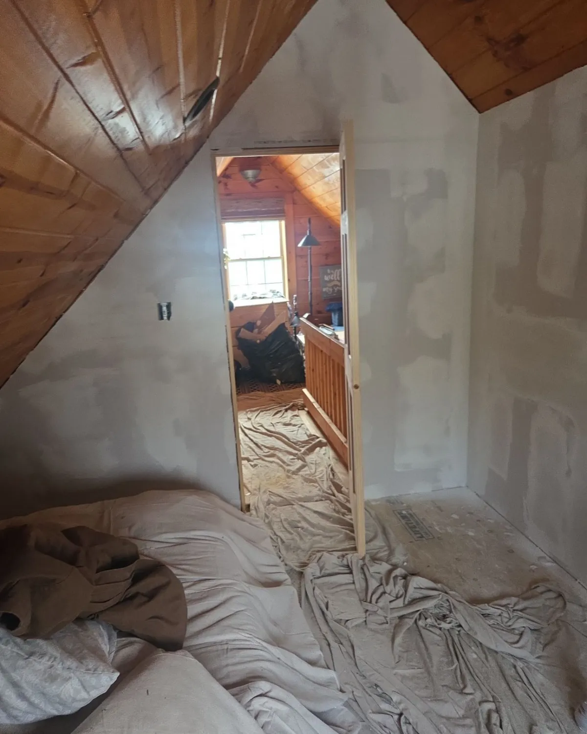 Interior hallway protected during drywall renovation