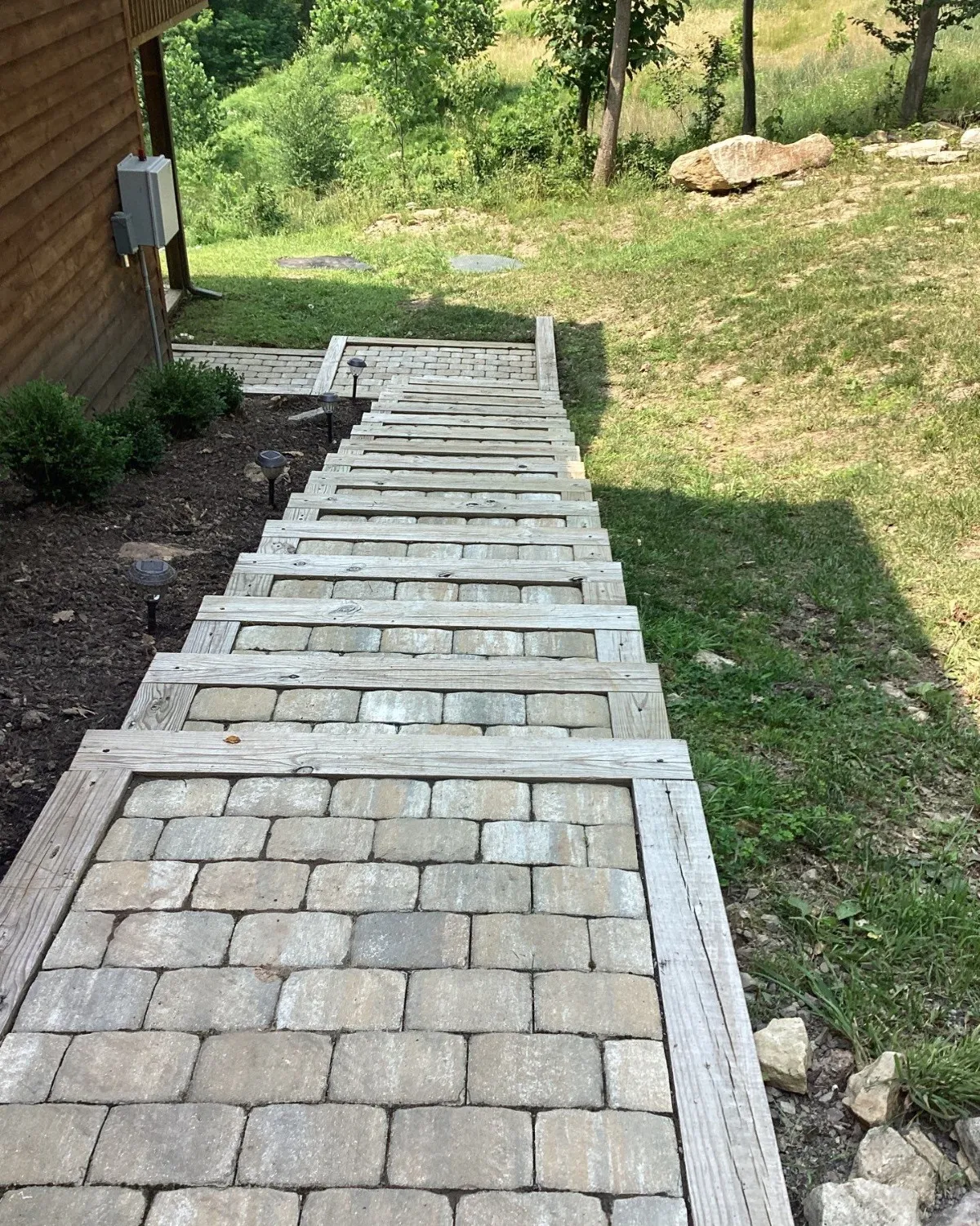Walkway area excavated before paver installation