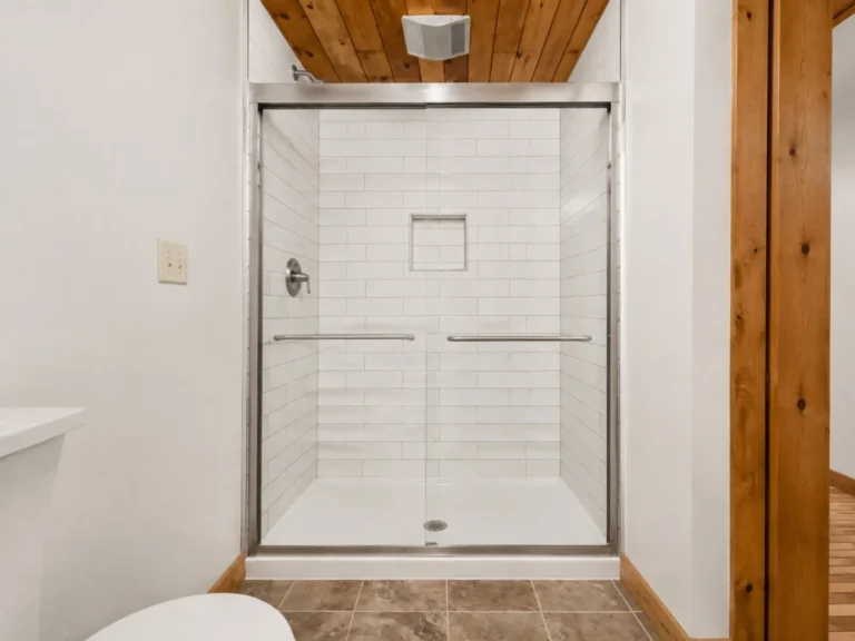 Finished white tub and shower surround