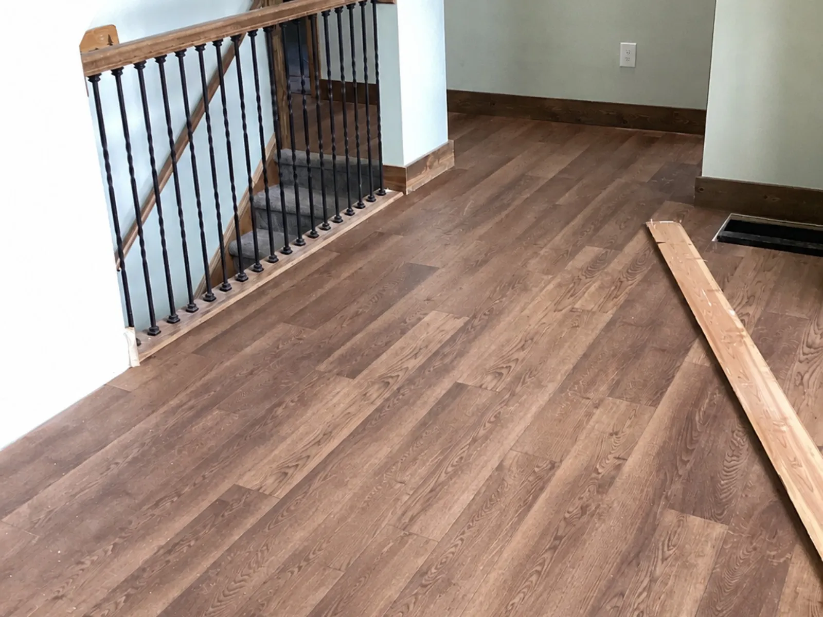 Carpentry services provided by Hammer and Nails Handyman showing new hardwood flooring