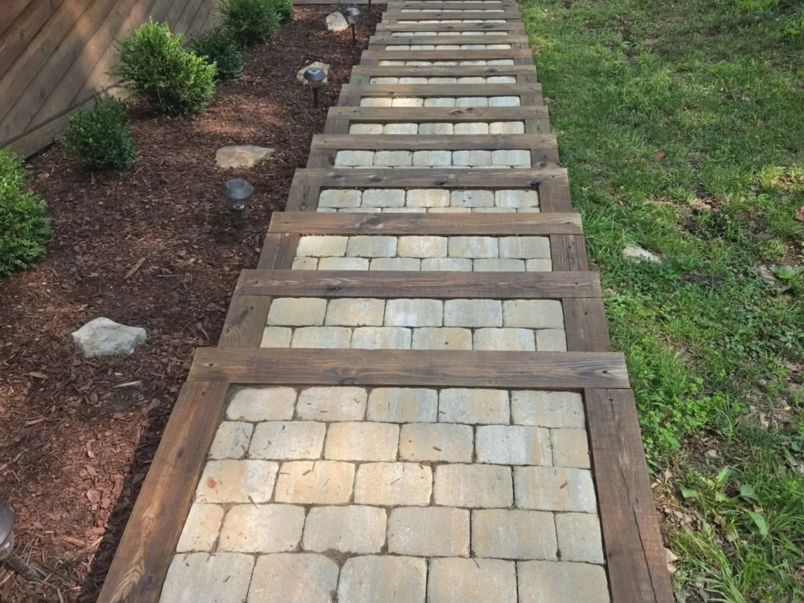 Refreshed Paver Walkway with Stained Timber Borders